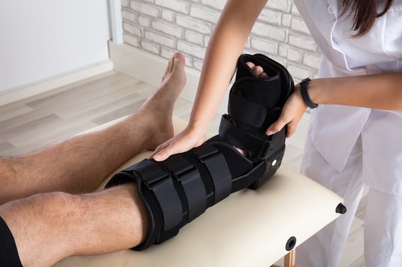 wearing a walking boot for plantar fasciitis